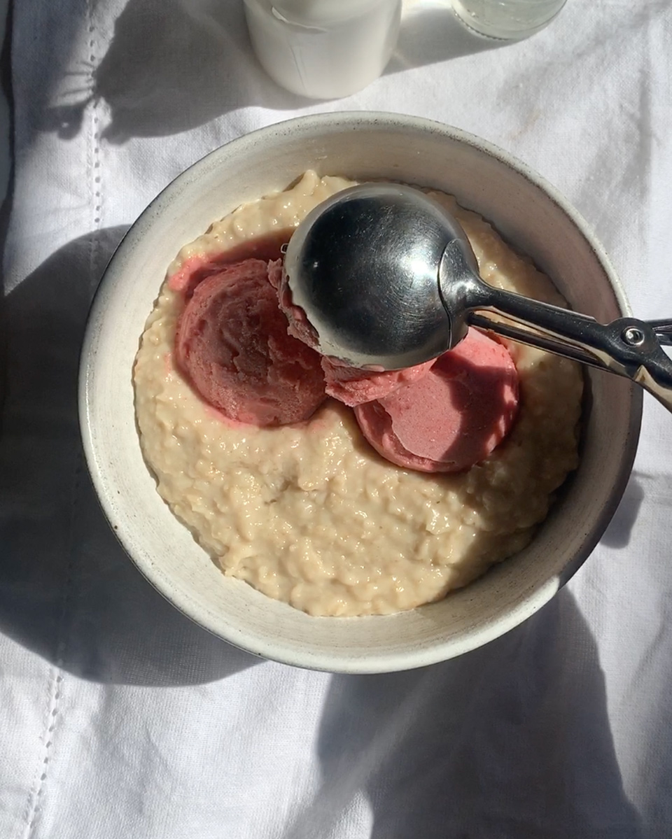 scoops of jelly nice-cream on oatmeal bowl